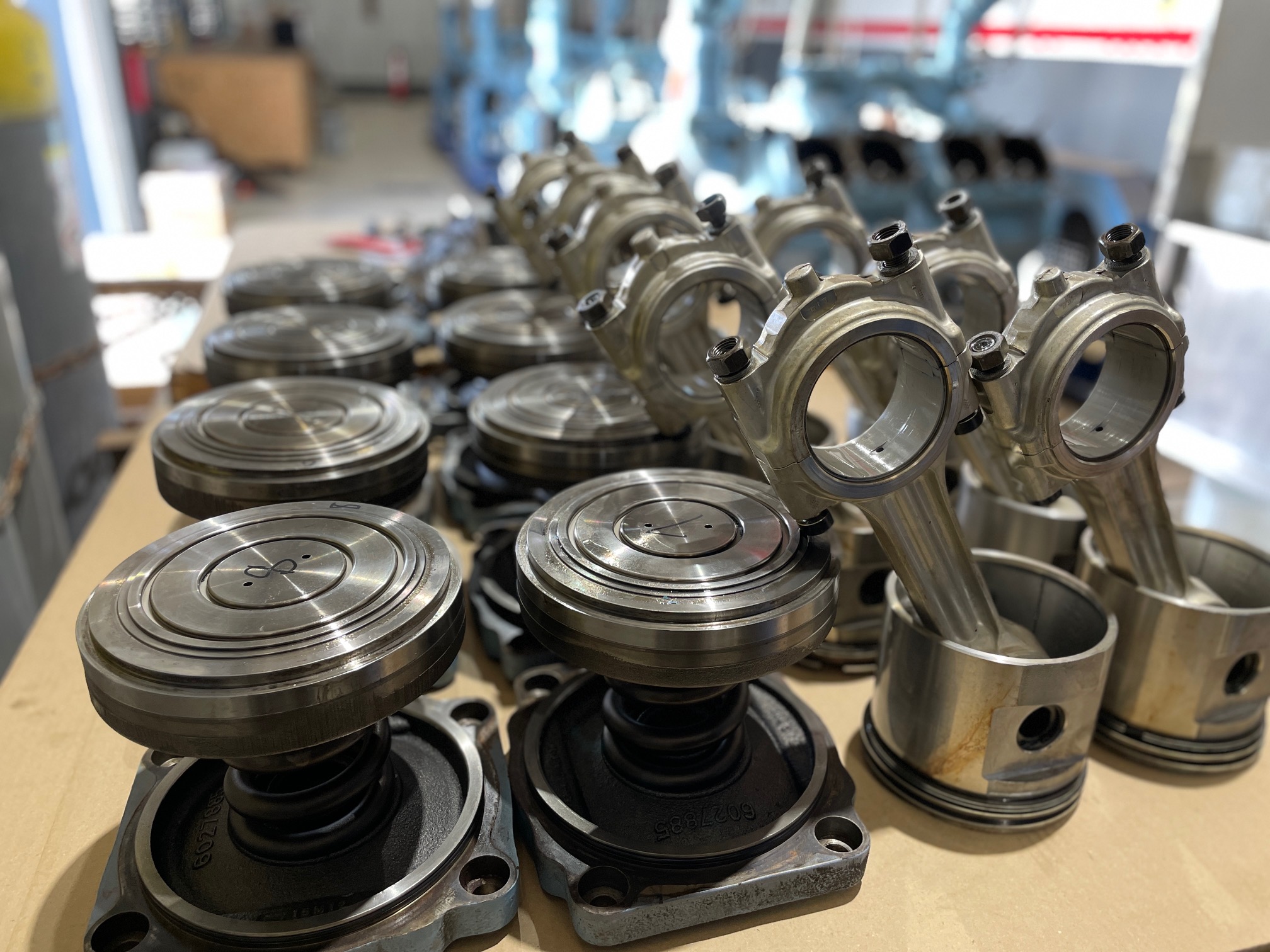 Pistons and connecting rods of an industrial NH₃ compressor station